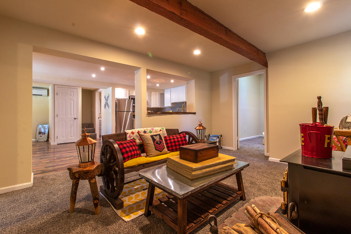 53475 Tollgate Road Idyllwild, CA 92549 - Photo 20 of 46 a living room with furniture and a dining table with wooden floor