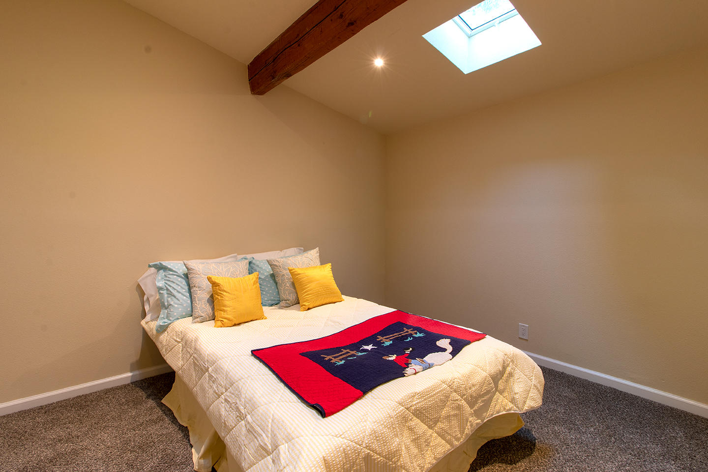 53475 Tollgate Road Idyllwild, CA 92549 - Photo 24 of 46 a bedroom with a bed and a night stand