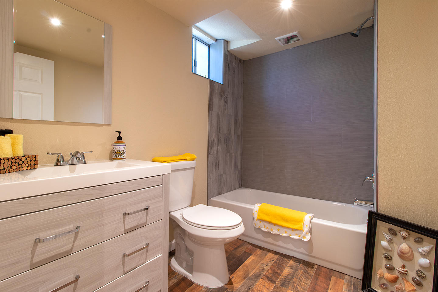 53475 Tollgate Road Idyllwild, CA 92549 - Photo 27 of 46 a bathroom with a sink mirror vanity and toilet