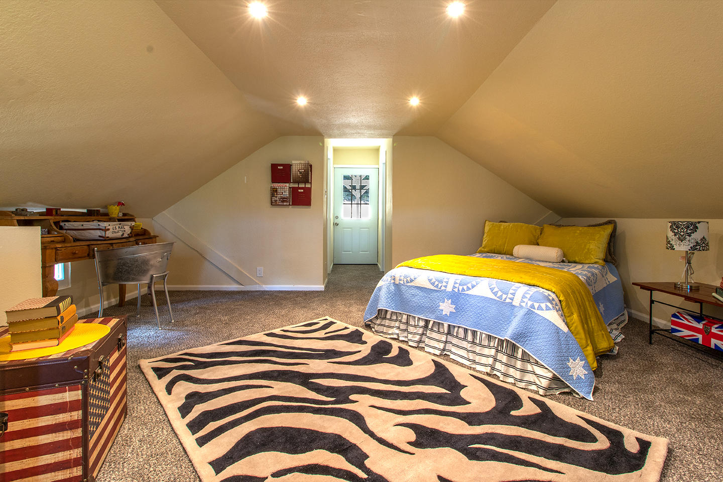 53475 Tollgate Road Idyllwild, CA 92549 - Photo 31 of 46 a bedroom with a bed and wooden floor