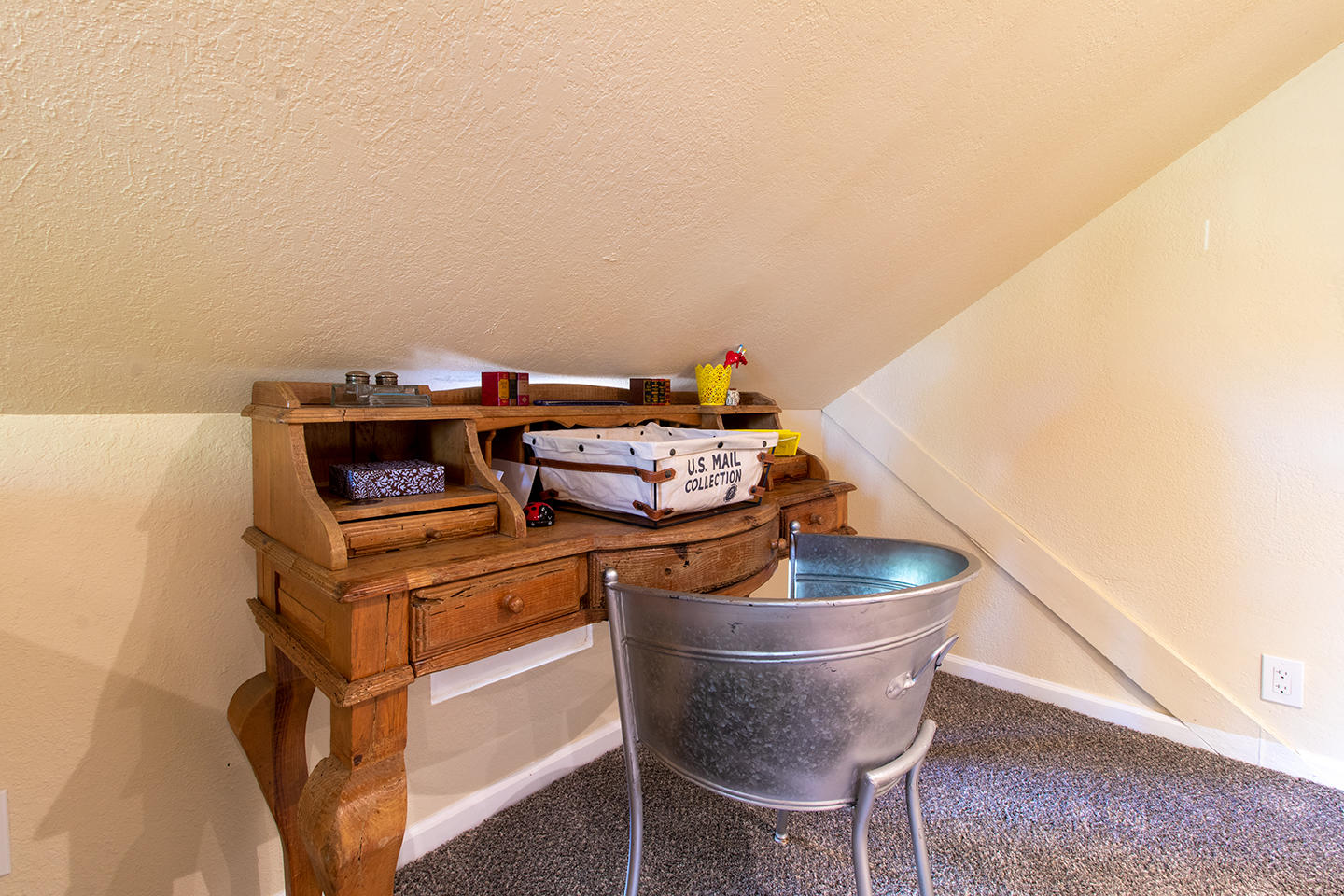 53475 Tollgate Road Idyllwild, CA 92549 - Photo 32 of 46 a living room with a stove and a microwave
