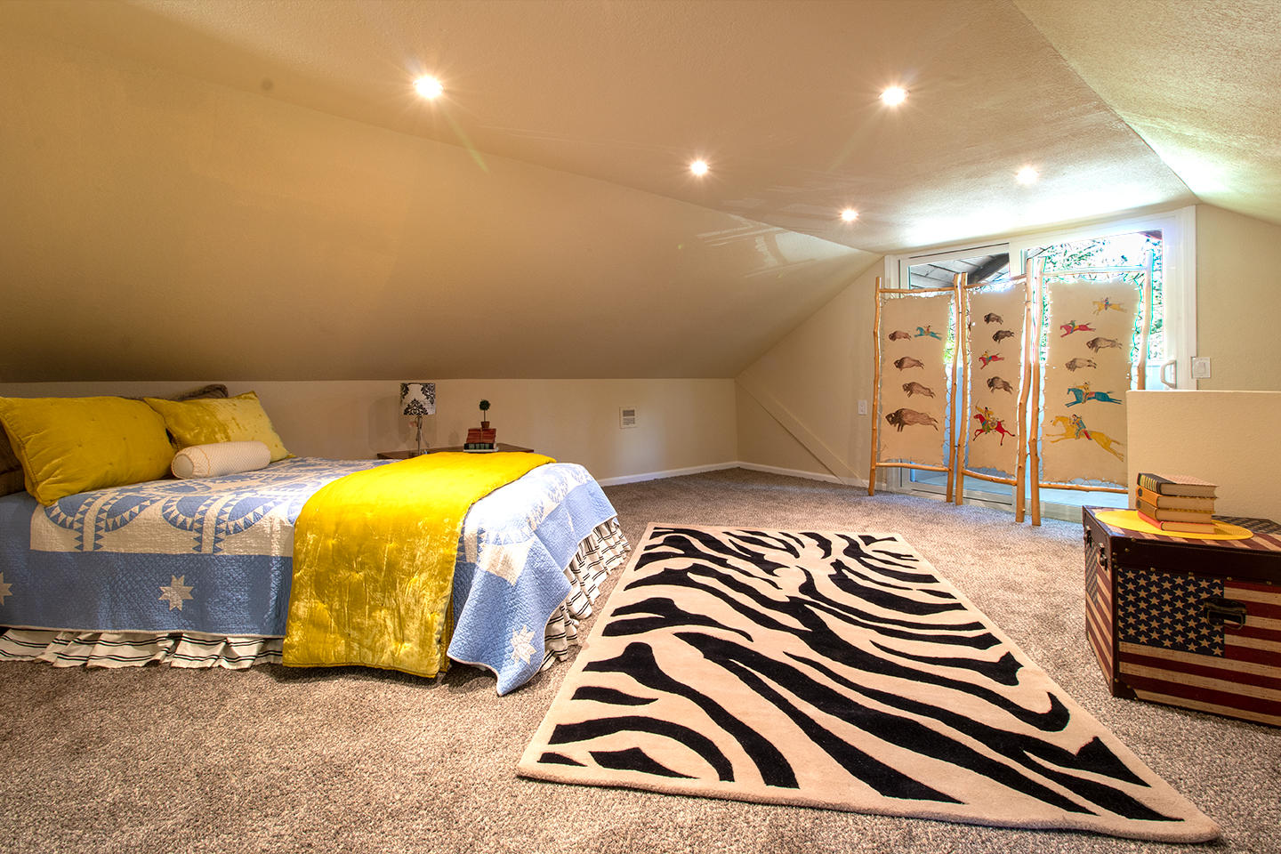53475 Tollgate Road Idyllwild, CA 92549 - Photo 33 of 46 a bedroom with a bed and wooden floor