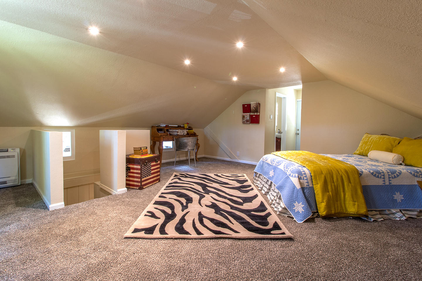 53475 Tollgate Road Idyllwild, CA 92549 - Photo 37 of 46 a bedroom with a bed and a walk in closet