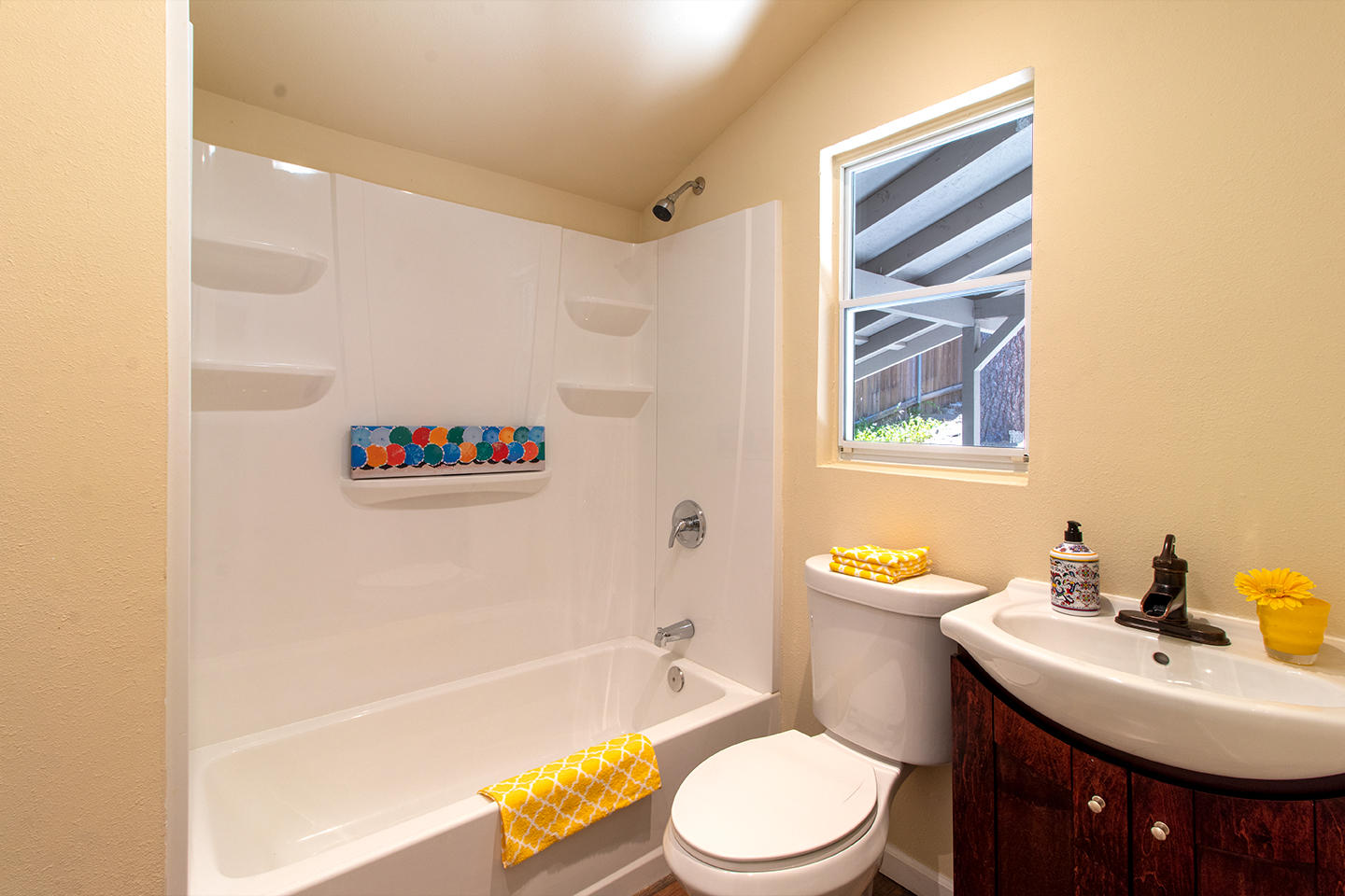 53475 Tollgate Road Idyllwild, CA 92549 - Photo 38 of 46 a bathroom with a sink a toilet and a bathtub