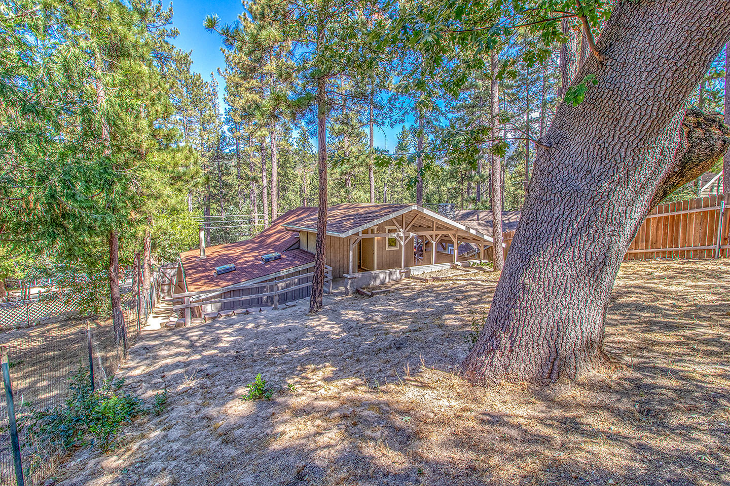 53475 Tollgate Road Idyllwild, CA 92549 - Photo 42 of 46 a small house with a trees in the background
