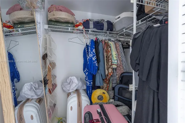 a bathroom with a sink toilet tub and shower