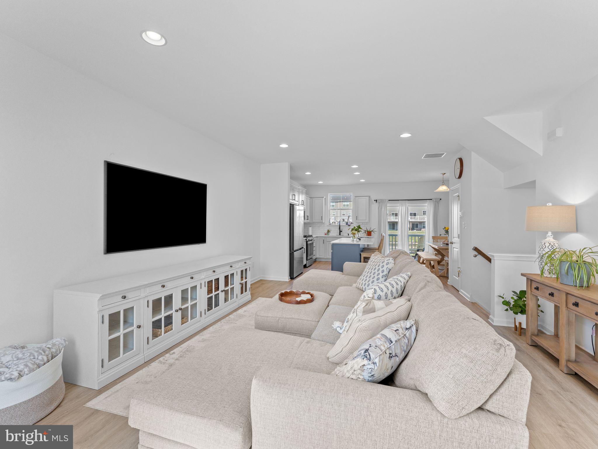 14 Aviary Road West Deptford, NJ 08086 - Photo 17 of 39 a living room with furniture and a flat screen tv