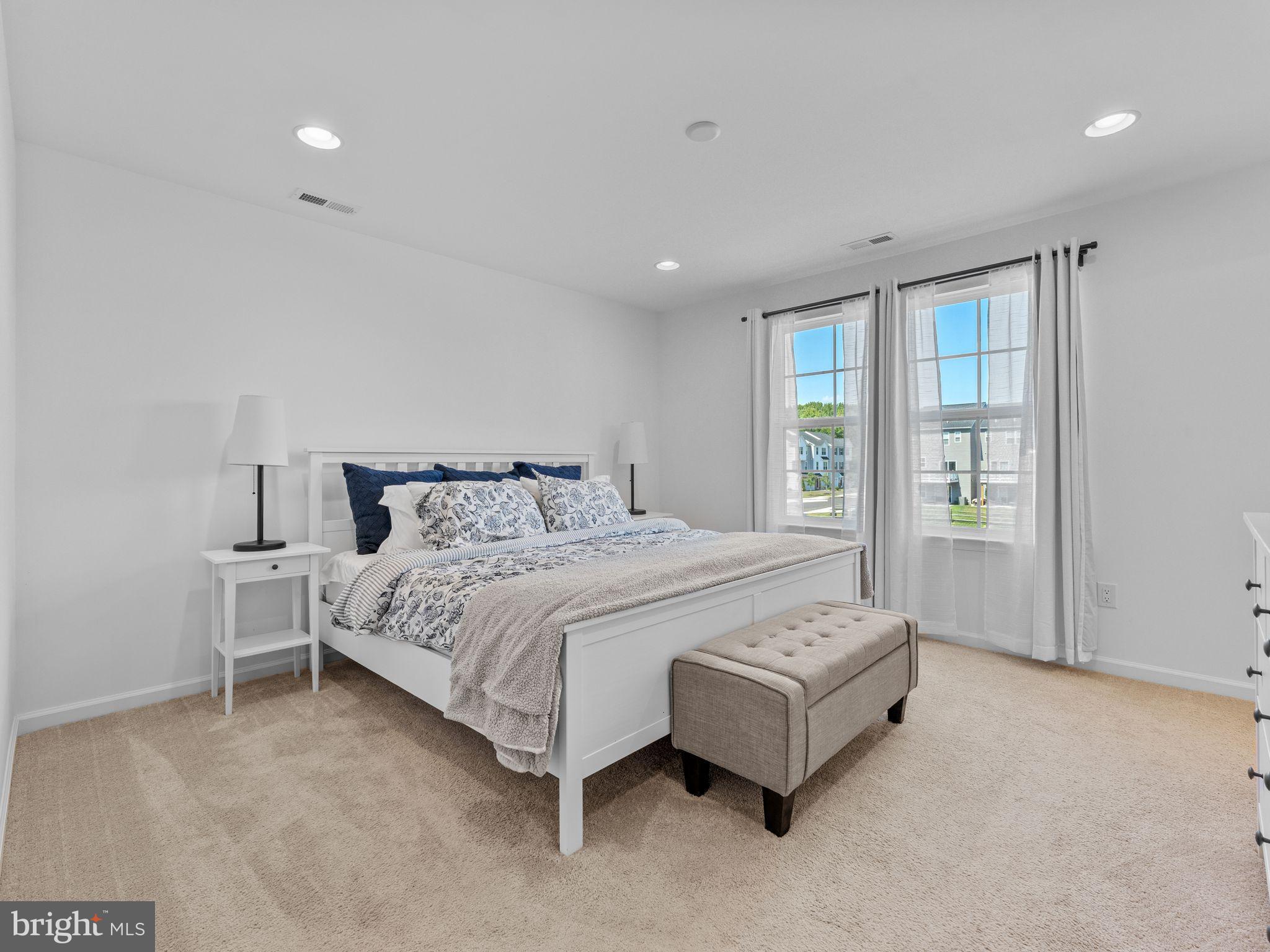 14 Aviary Road West Deptford, NJ 08086 - Photo 19 of 39 a spacious bedroom with a bed and a couch
