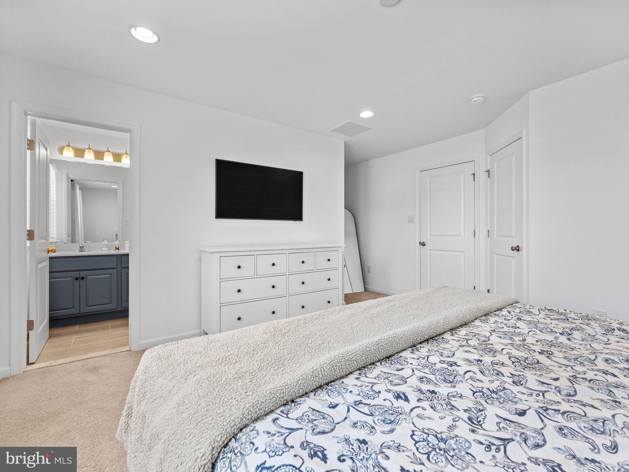 14 Aviary Road West Deptford, NJ 08086 - Photo 21 of 39 a bedroom with a bed and a flat screen tv