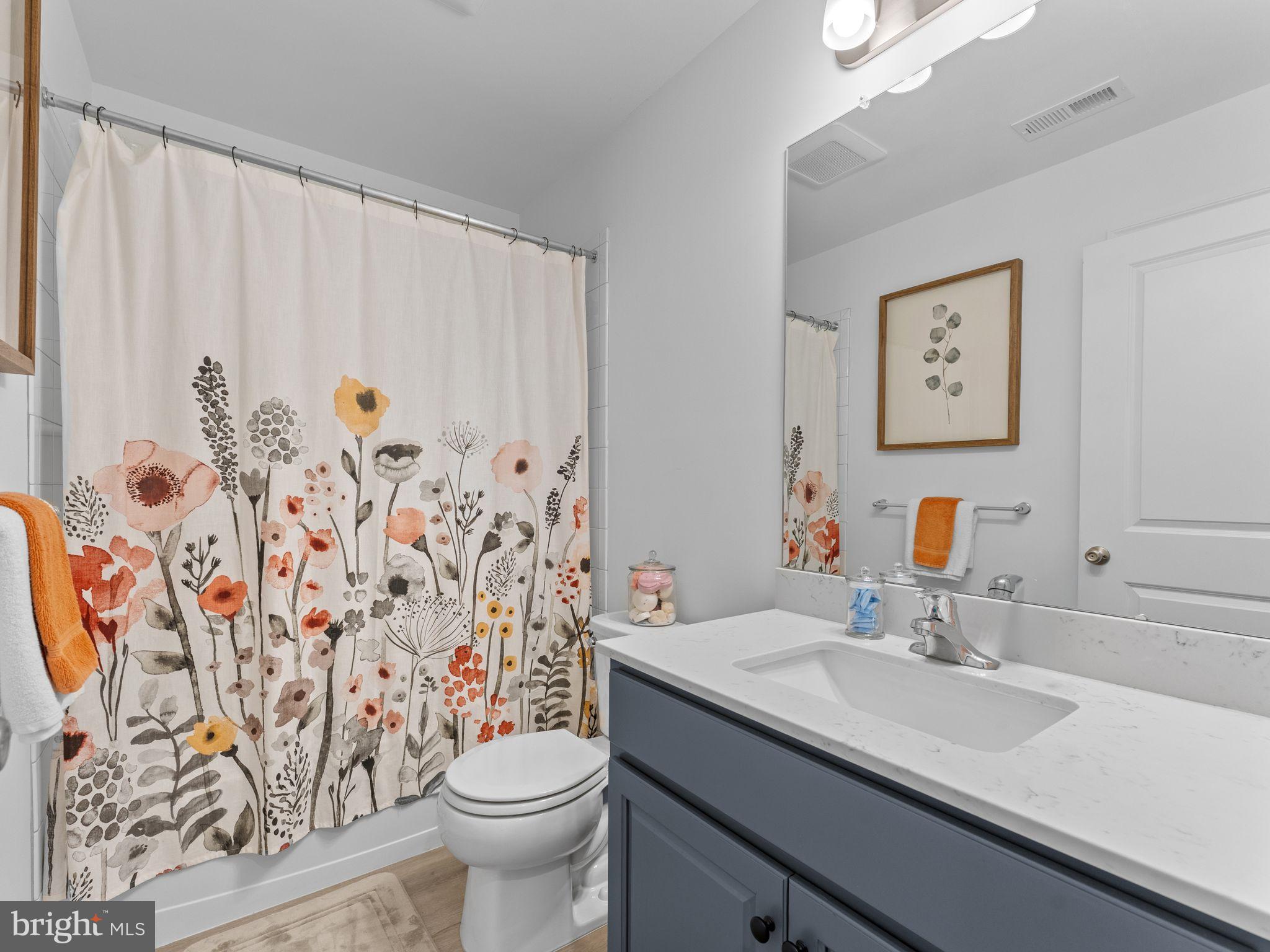 14 Aviary Road West Deptford, NJ 08086 - Photo 29 of 39 a bathroom with a granite countertop sink and a toilet