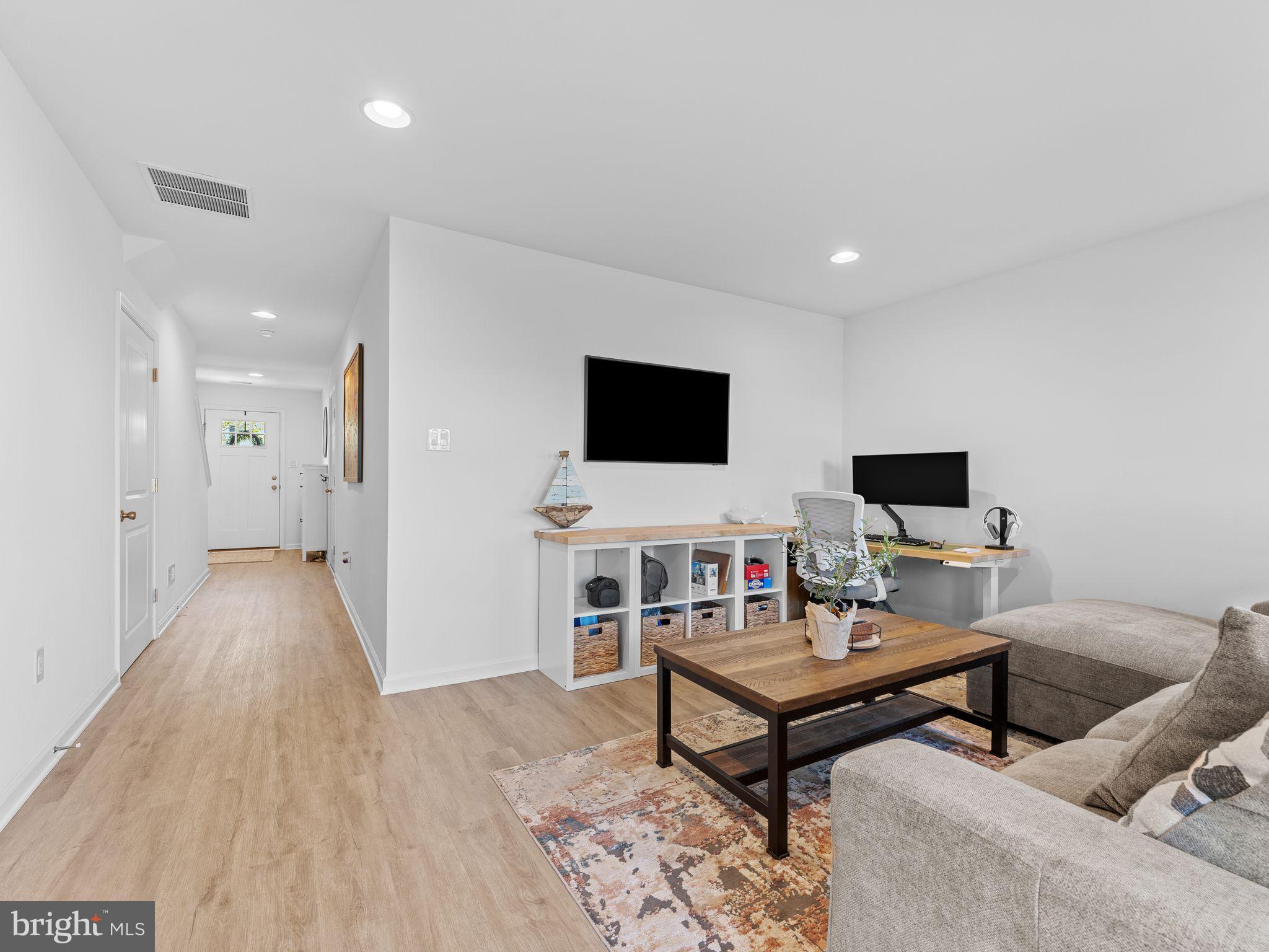 14 Aviary Road West Deptford, NJ 08086 - Photo 6 of 39 a living room with furniture and a flat screen tv