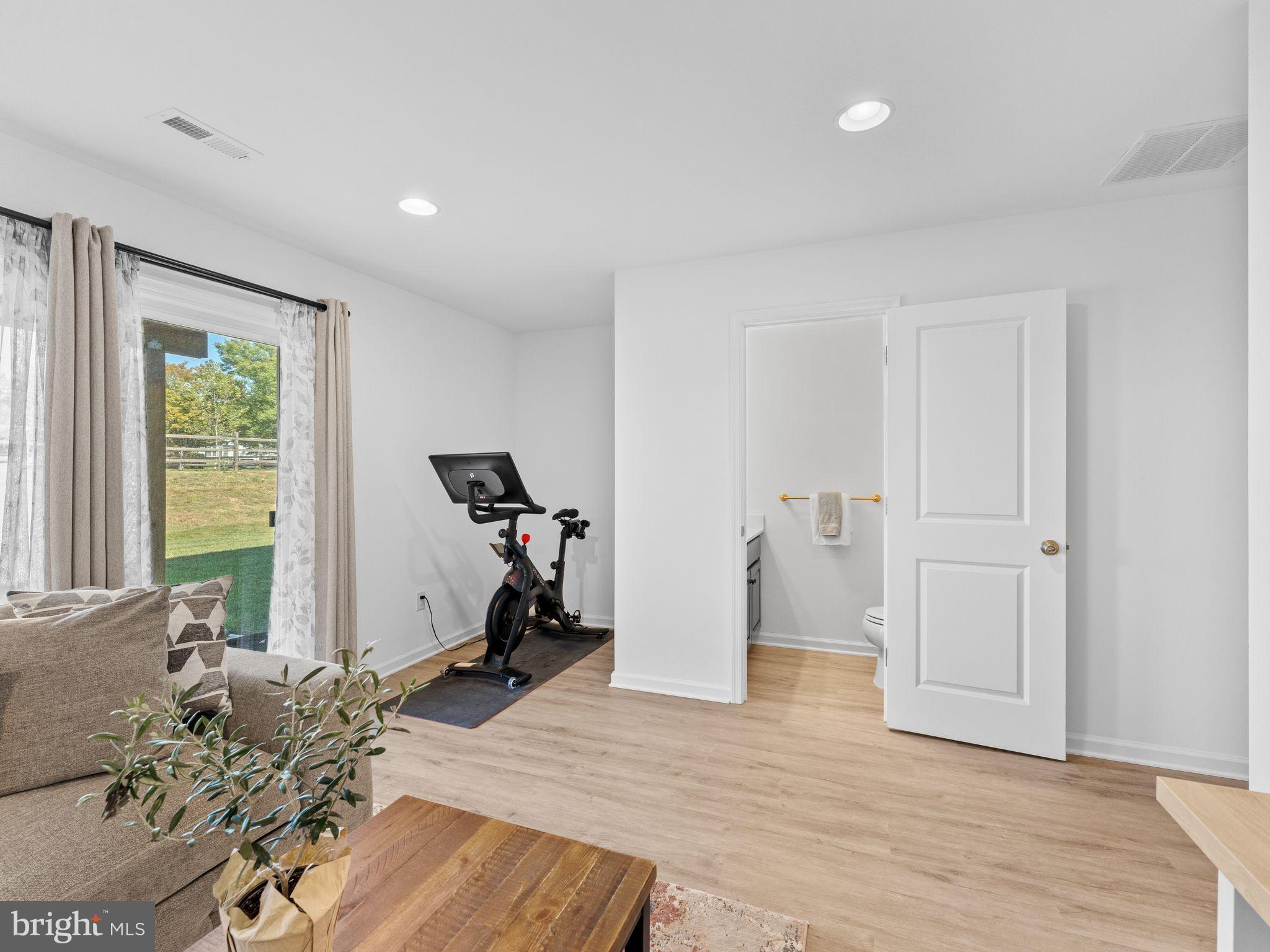 14 Aviary Road West Deptford, NJ 08086 - Photo 7 of 39 a view of a room with gym equipment