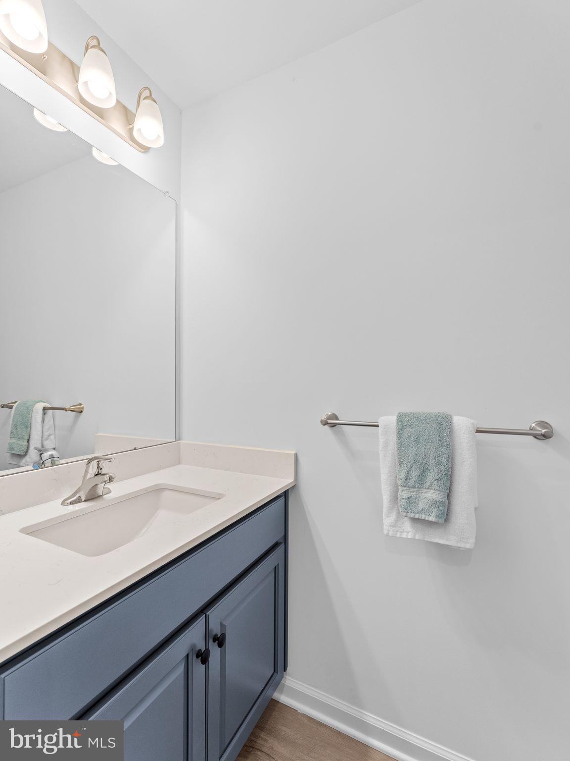 14 Aviary Road West Deptford, NJ 08086 - Photo 8 of 39 a bathroom with a sink vanity and a mirror