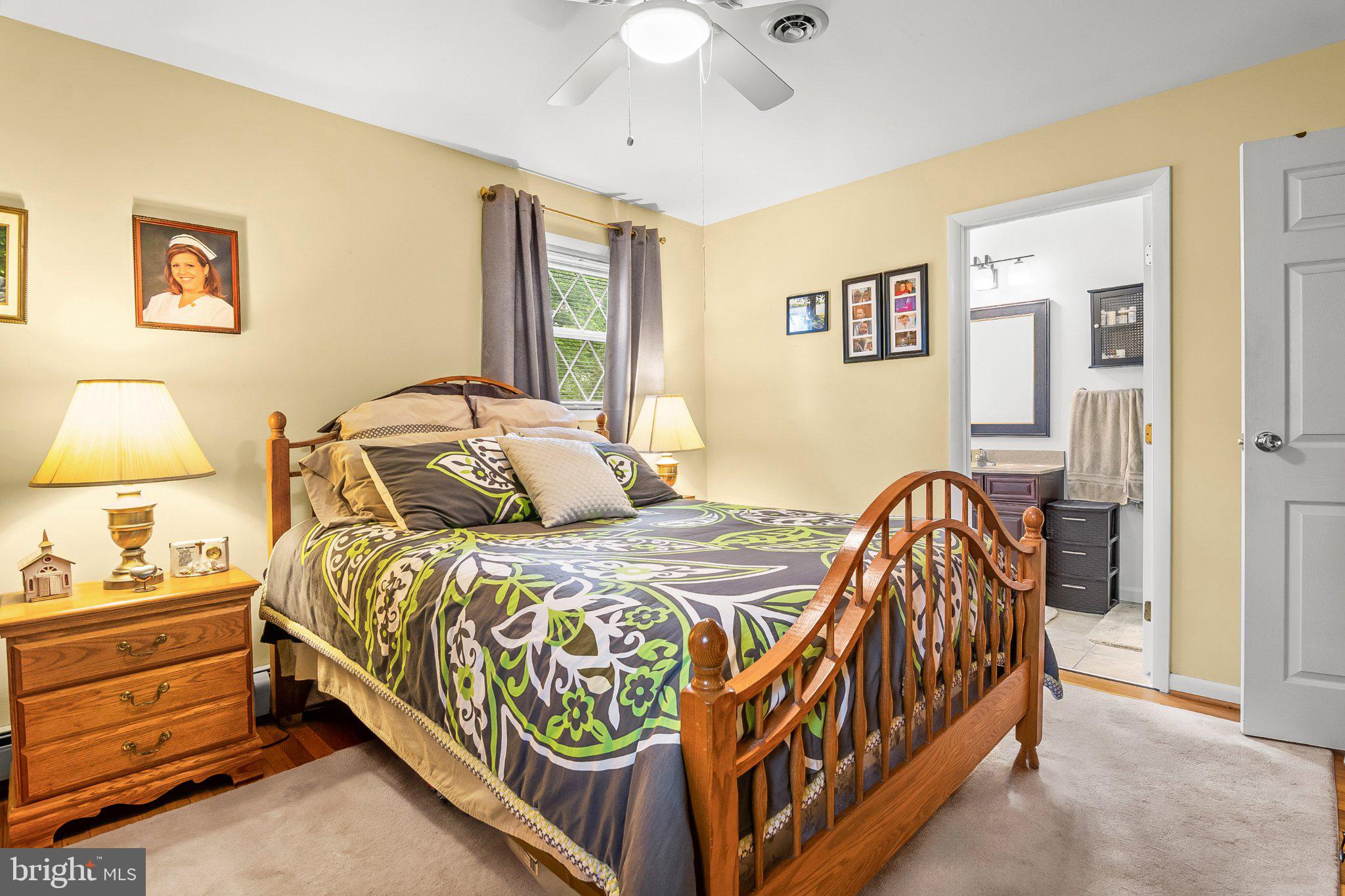 5412 Ridge Road Mount Airy, MD 21771 - Photo 15 of 38 Cozy bedroom with warm, inviting hues.