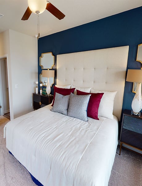 8111 Springsteen Drive Austin, TX 78744 - Photo 9 of 10 Bedroom featuring light colored carpet and a ceiling fan