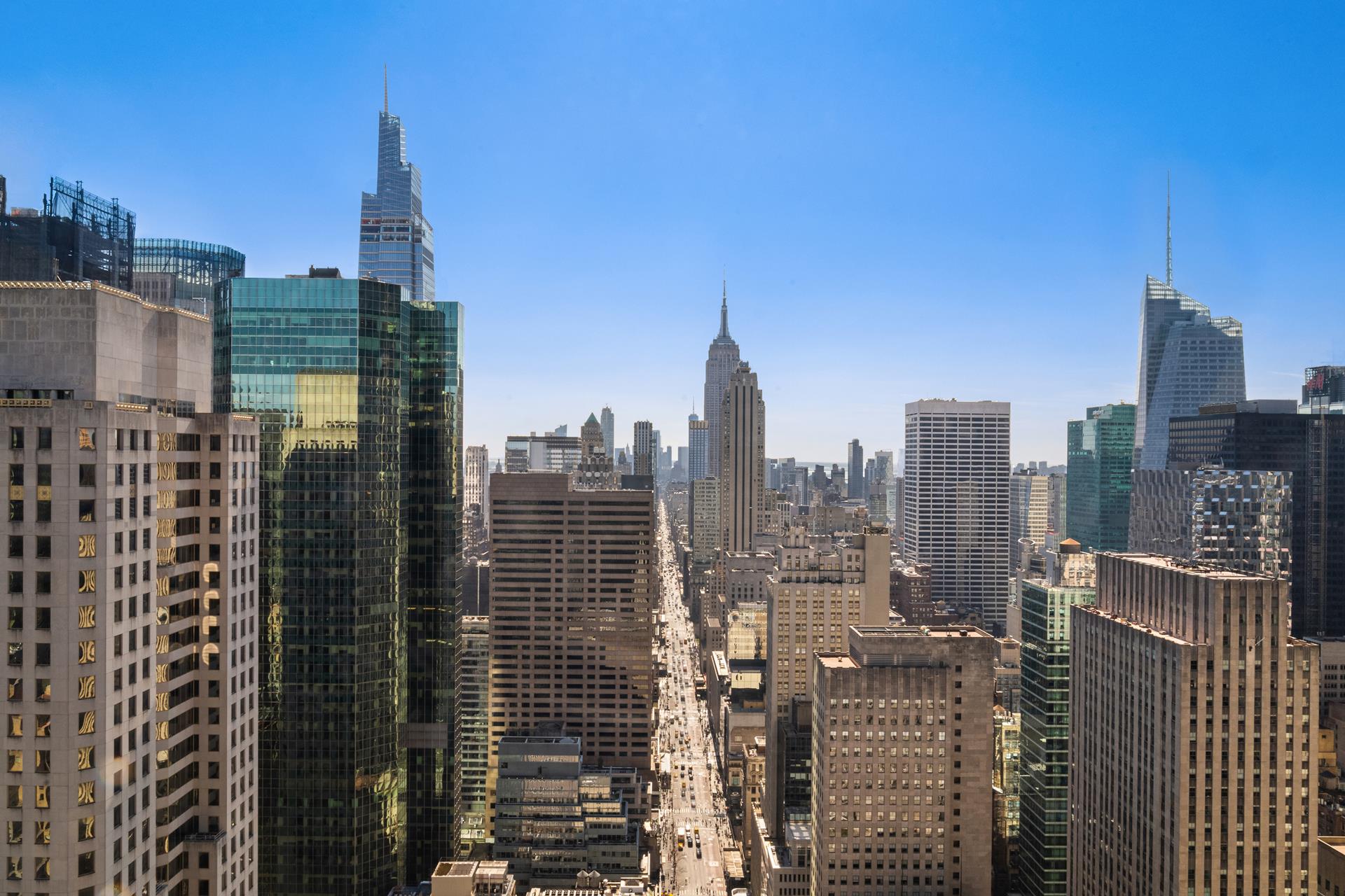 641 5th Avenue, Unit 42H Manhattan, NY 10022 - Photo 14 of 16 a view of city with tall buildings