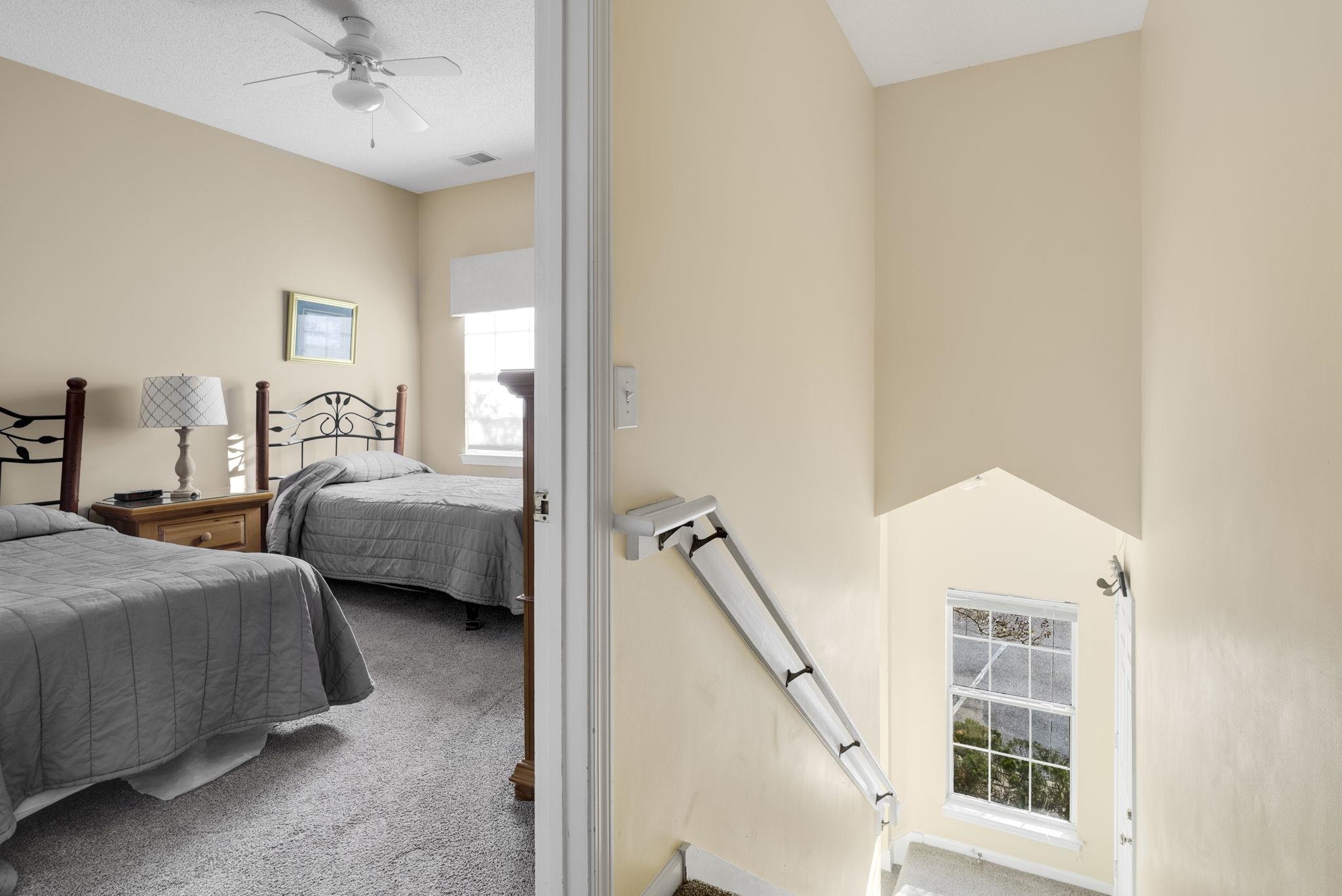 4499 Girvan Drive, Unit H Myrtle Beach, SC 29579 - Photo 22 of 35 Bedroom with carpet and a ceiling fan