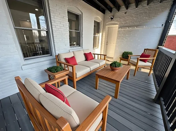 a living room with furniture and a table