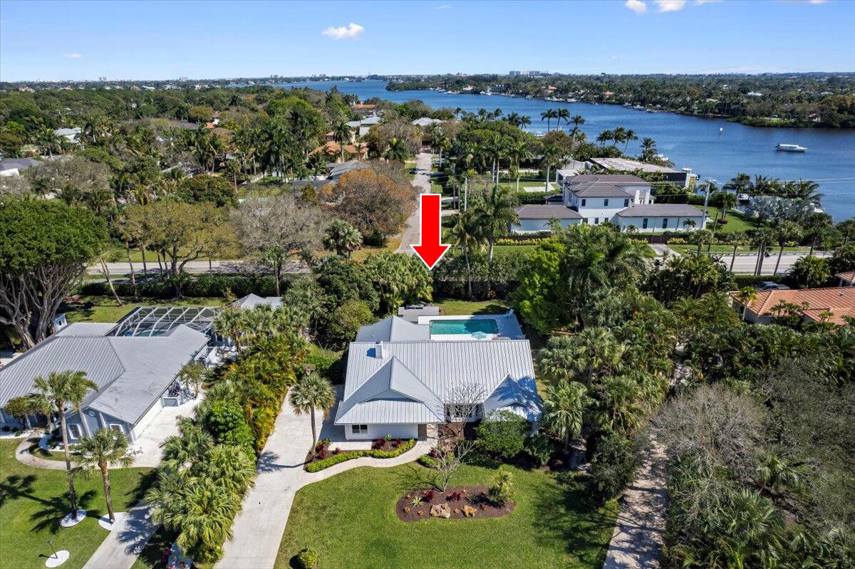 5776 Senegal Drive Jupiter, FL 33458 - Photo 1 of 57 aerial with arrow