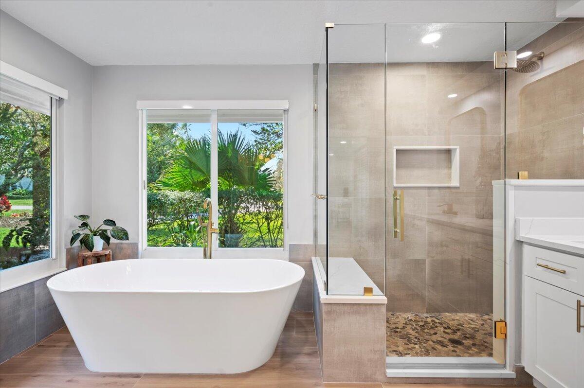 5776 Senegal Drive Jupiter, FL 33458 - Photo 23 of 57 primary bathroom tub & shower