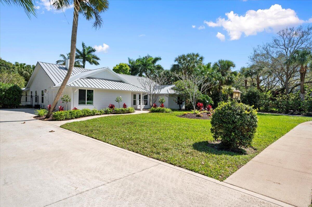 5776 Senegal Drive Jupiter, FL 33458 - Photo 7 of 57 driveway