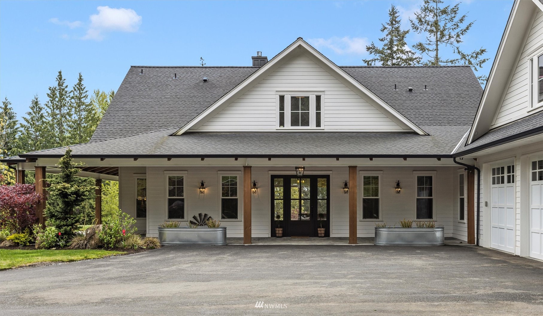 8209 Spada Road Snohomish, WA 98290 - Photo 3 of 39 a view of a house and outdoor space