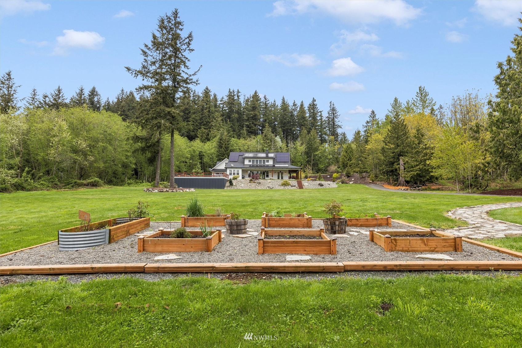 8209 Spada Road Snohomish, WA 98290 - Photo 36 of 39 a view of a lake with a yard