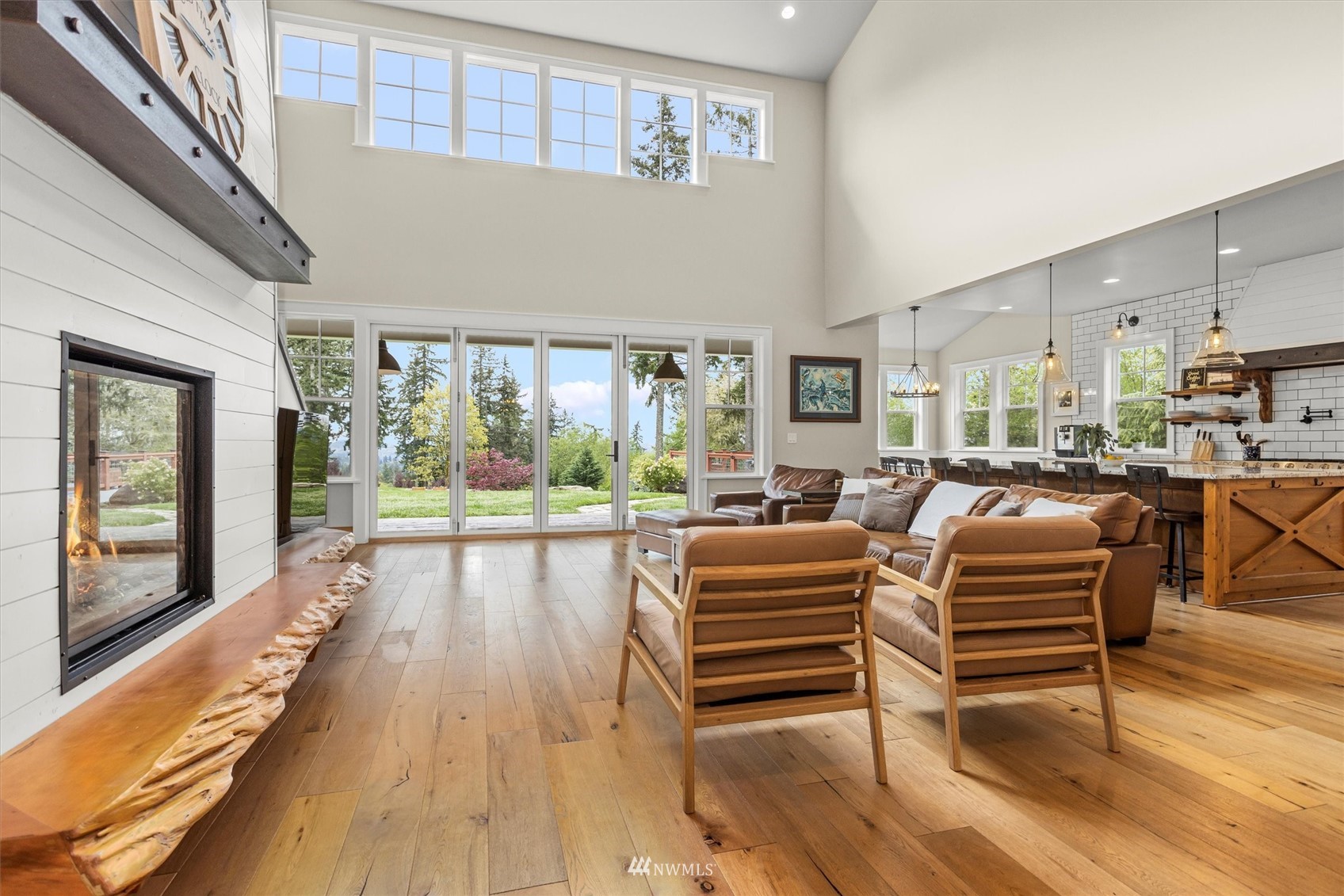 8209 Spada Road Snohomish, WA 98290 - Photo 7 of 39 a living room with furniture and a large window