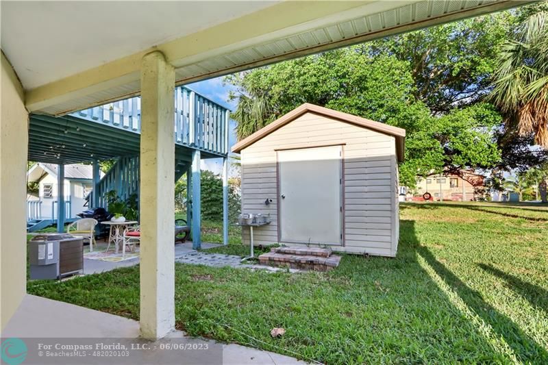1128 Hernando Street Fort Pierce, FL 34949 - Photo 16 of 46 a view of a house with backyard