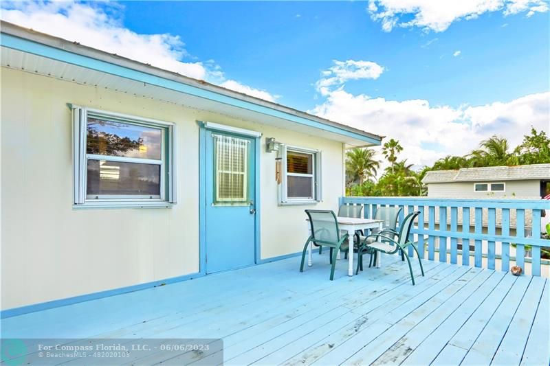 1128 Hernando Street Fort Pierce, FL 34949 - Photo 19 of 46 a view of a house with patio outdoor seating