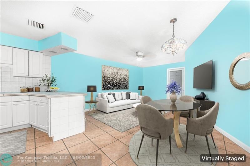 1128 Hernando Street Fort Pierce, FL 34949 - Photo 28 of 46 a living room with furniture and a wooden floor