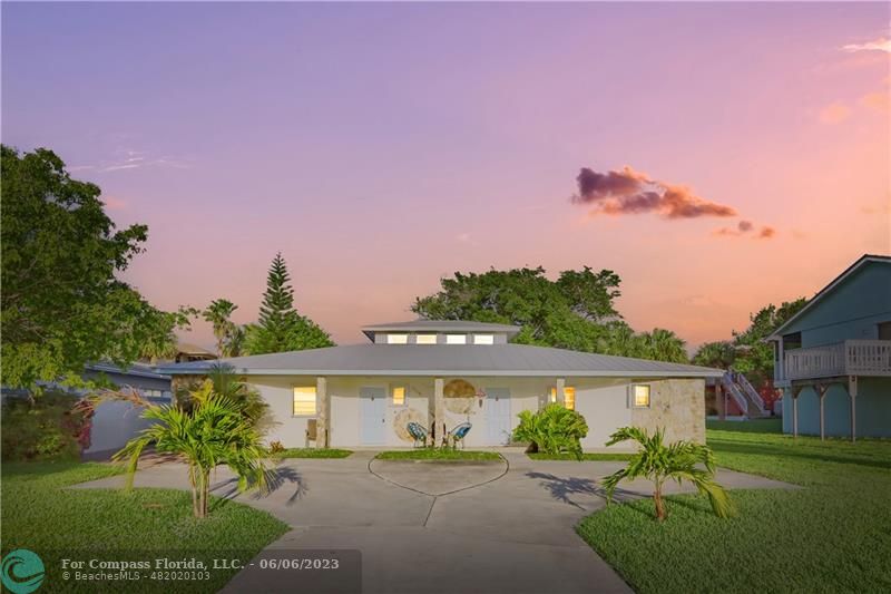 1128 Hernando Street Fort Pierce, FL 34949 - Photo 36 of 46 a view of a backyard with a garden and plants