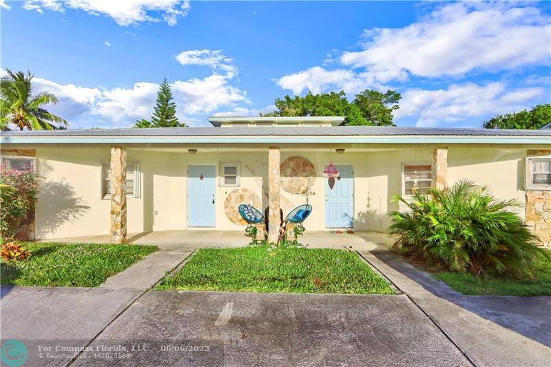 1128 Hernando Street Fort Pierce, FL 34949 - Photo 37 of 46 a front view of a house with garden
