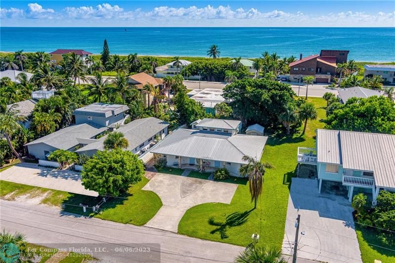 1128 Hernando Street Fort Pierce, FL 34949 - Photo 38 of 46 an aerial view of a house with garden space and outdoor seating