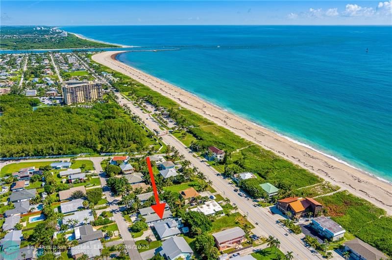 1128 Hernando Street Fort Pierce, FL 34949 - Photo 46 of 46 a view of a large body of water with a building in the background