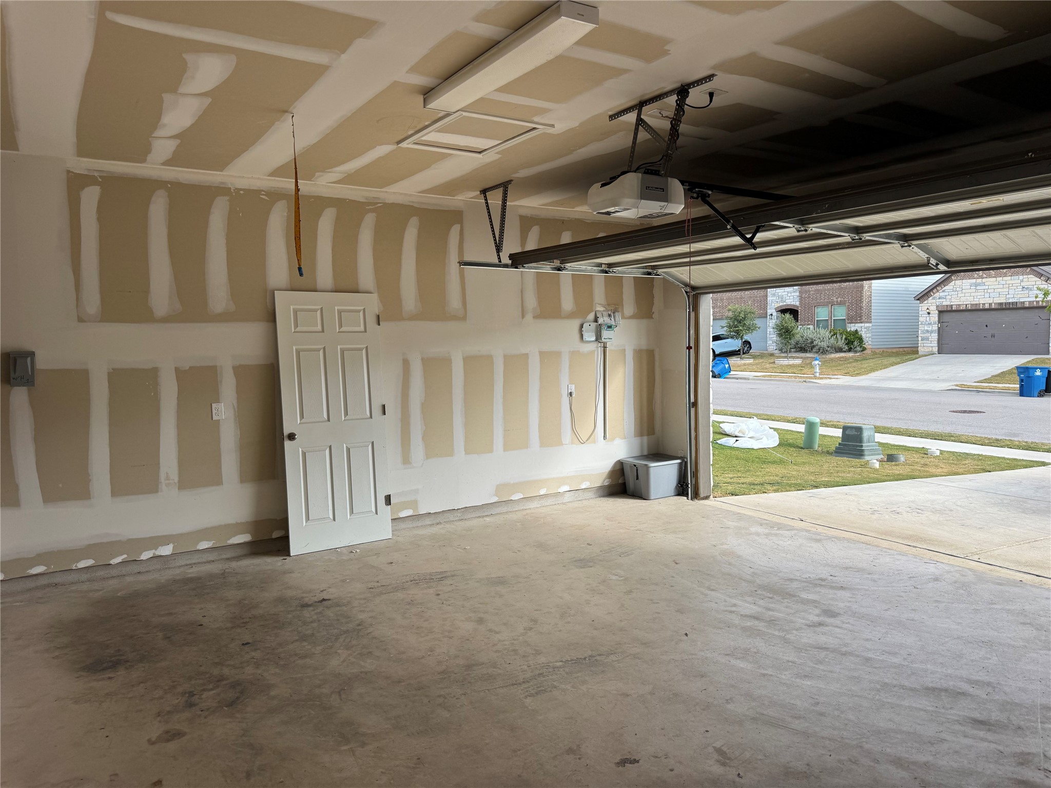 333 Capstone Road Liberty Hill, TX 78642 - Photo 39 of 40 Garage with a garage door opener