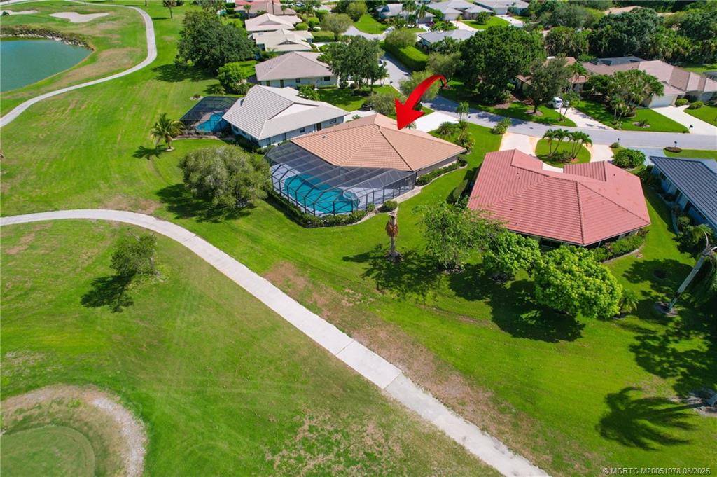 2284 Southwest Spoonbill Drive Palm City, FL 34990 - Photo 5 of 30 a view of a house with a garden