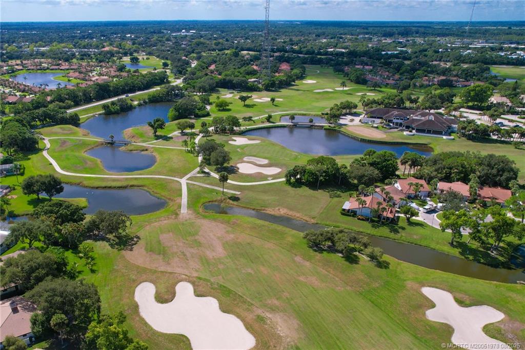 2284 Southwest Spoonbill Drive Palm City, FL 34990 - Photo 6 of 30 an aerial view of a houses and an outdoor space