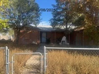 a view of a house with a yard balcony