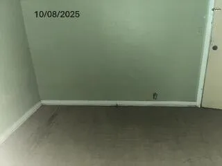 a bathroom with a toilet and a sink