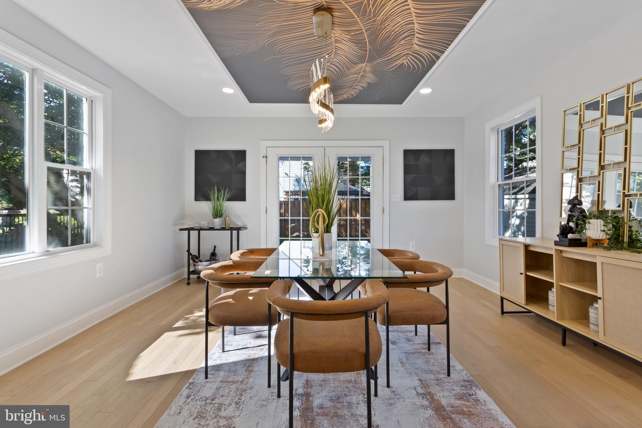 617 Greenbrier Drive Silver Spring, MD 20910 - Photo 17 of 70 a view of a dining room with furniture window and wooden floor