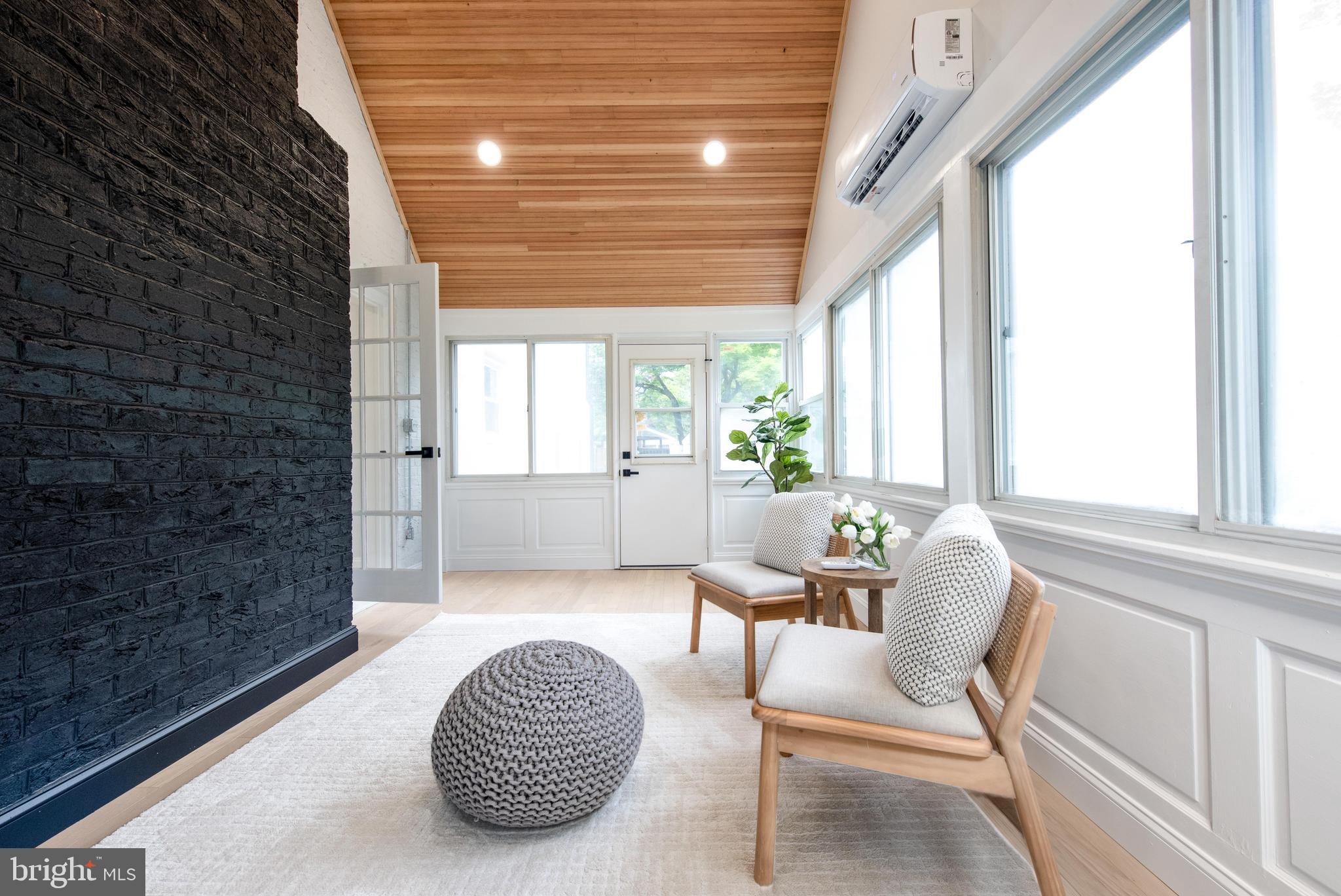 617 Greenbrier Drive Silver Spring, MD 20910 - Photo 25 of 70 a living room with furniture and a large window