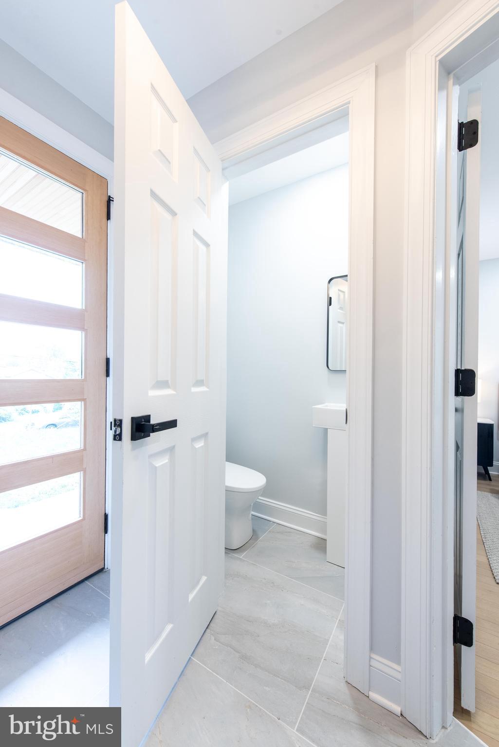 617 Greenbrier Drive Silver Spring, MD 20910 - Photo 29 of 70 a bathroom with a toilet a sink and shower