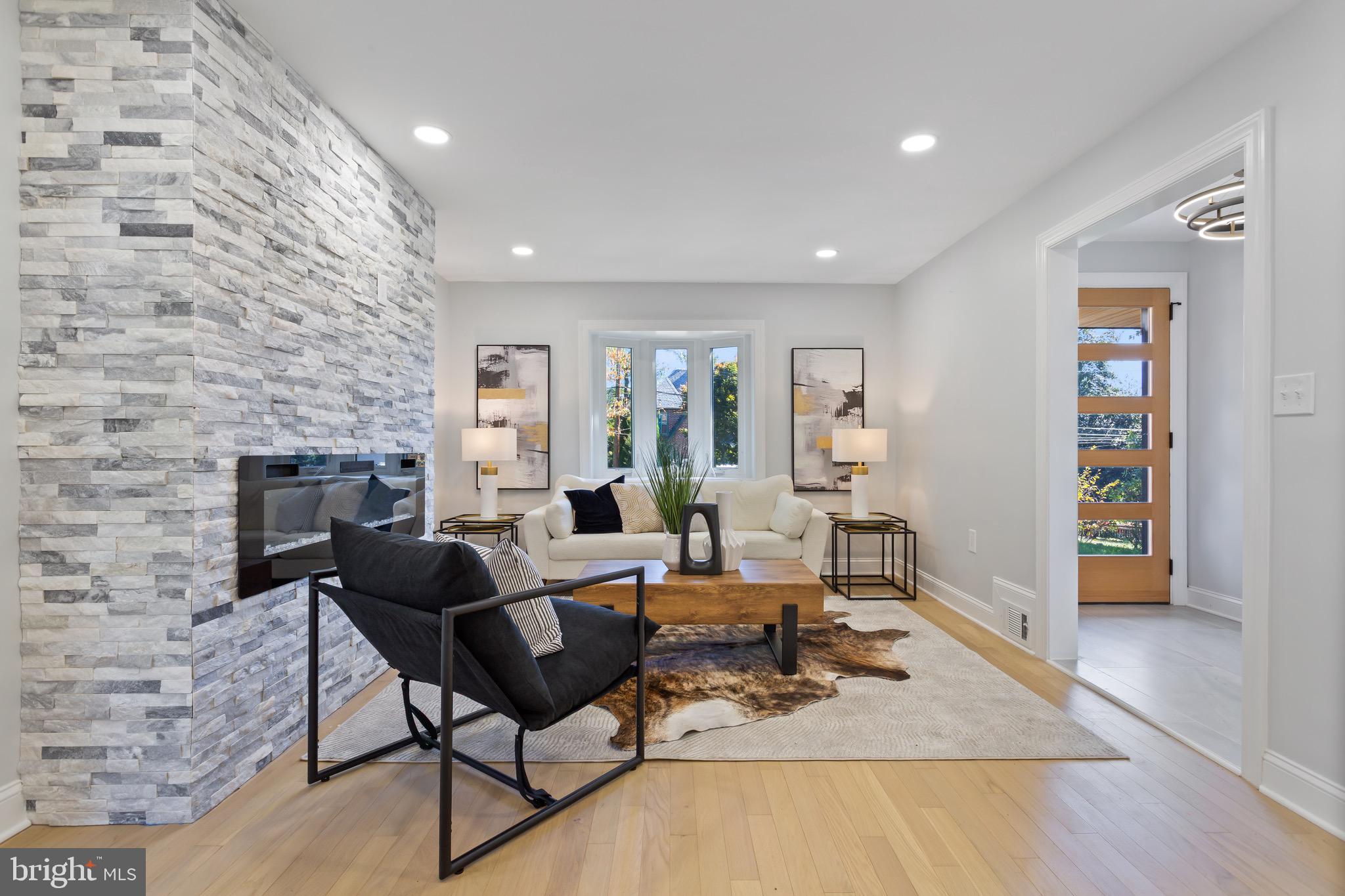 617 Greenbrier Drive Silver Spring, MD 20910 - Photo 3 of 70 a living room with furniture and a fireplace