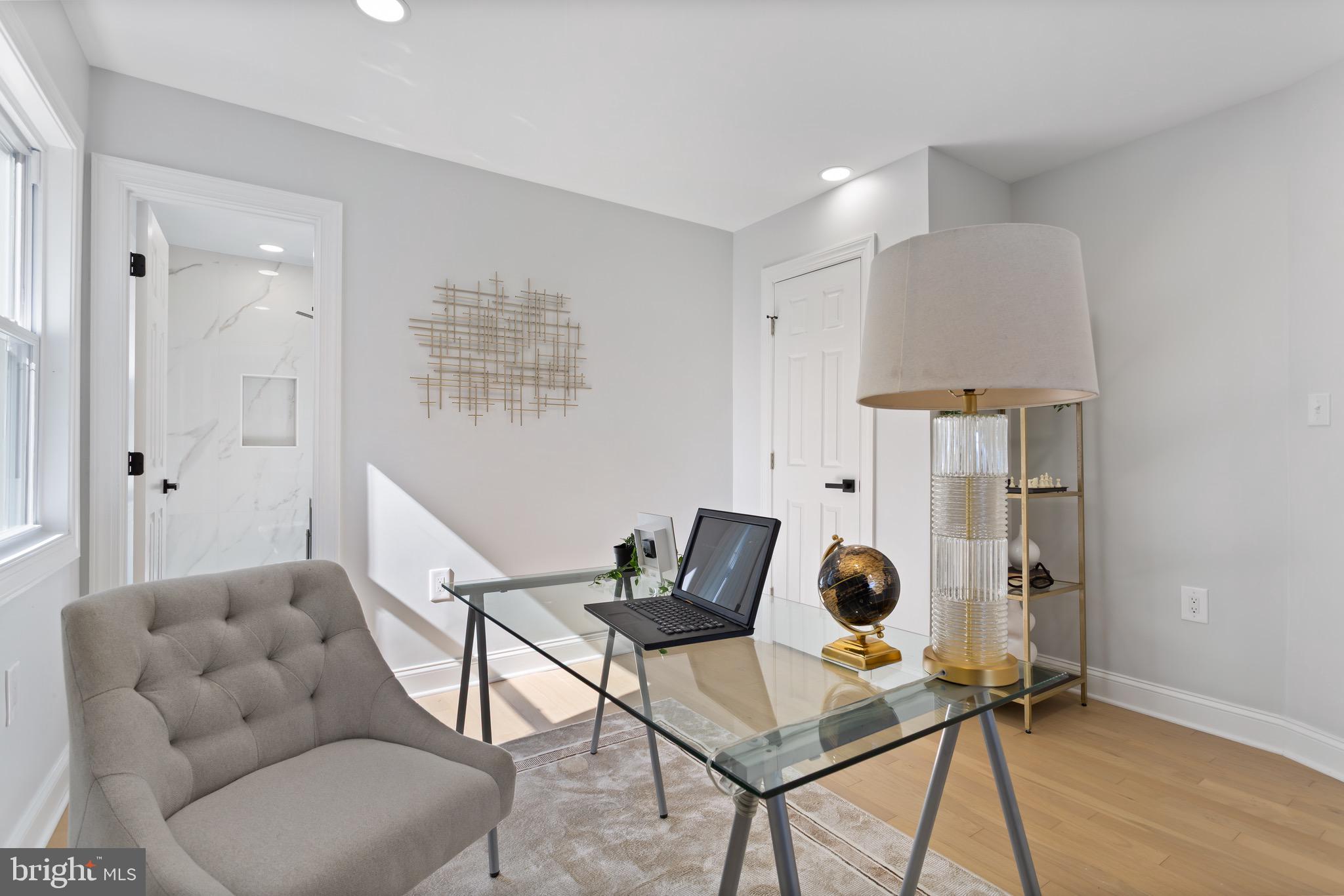 617 Greenbrier Drive Silver Spring, MD 20910 - Photo 32 of 70 a living room with furniture and a wooden floor