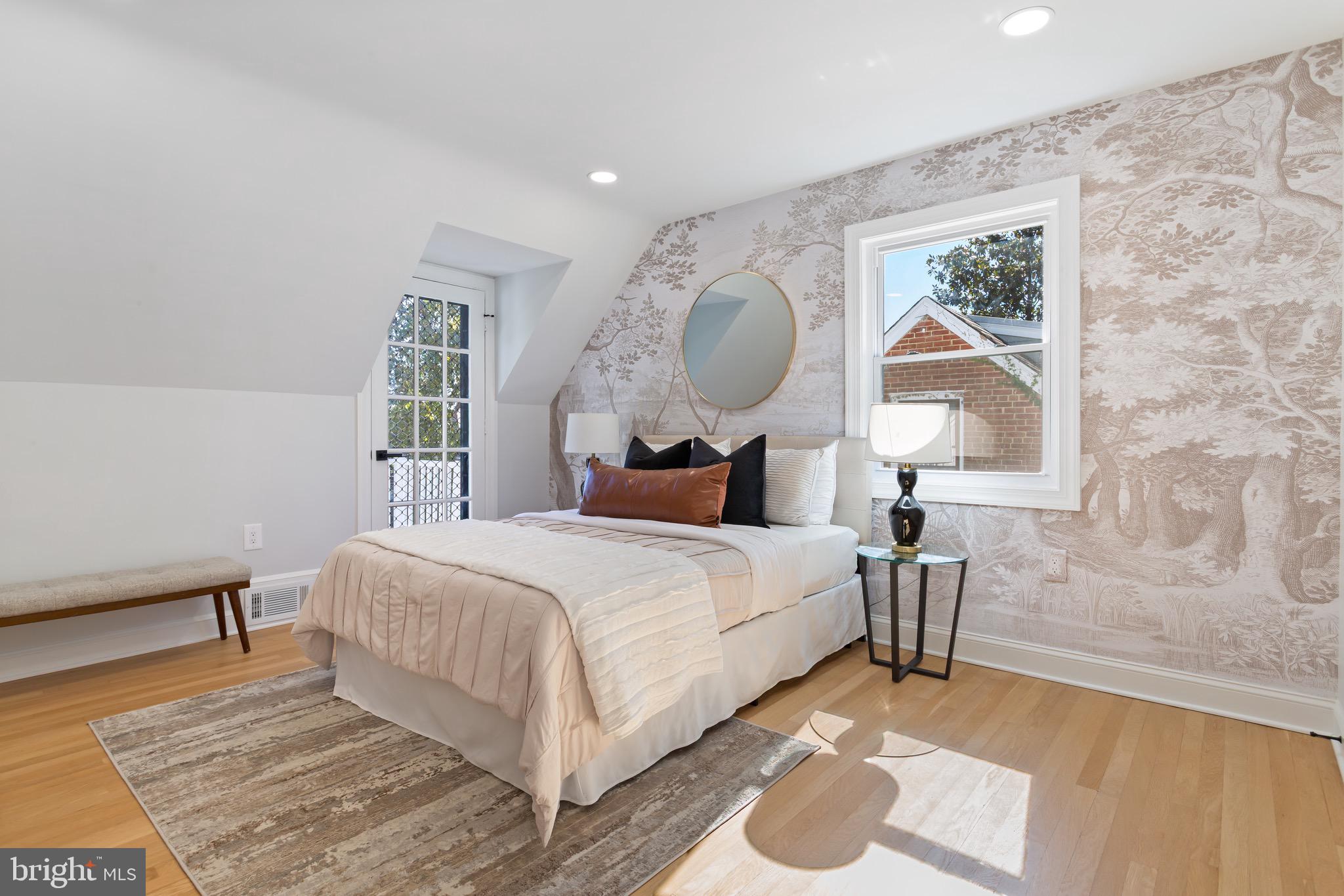 617 Greenbrier Drive Silver Spring, MD 20910 - Photo 38 of 70 a bedroom with a bed mirror and window