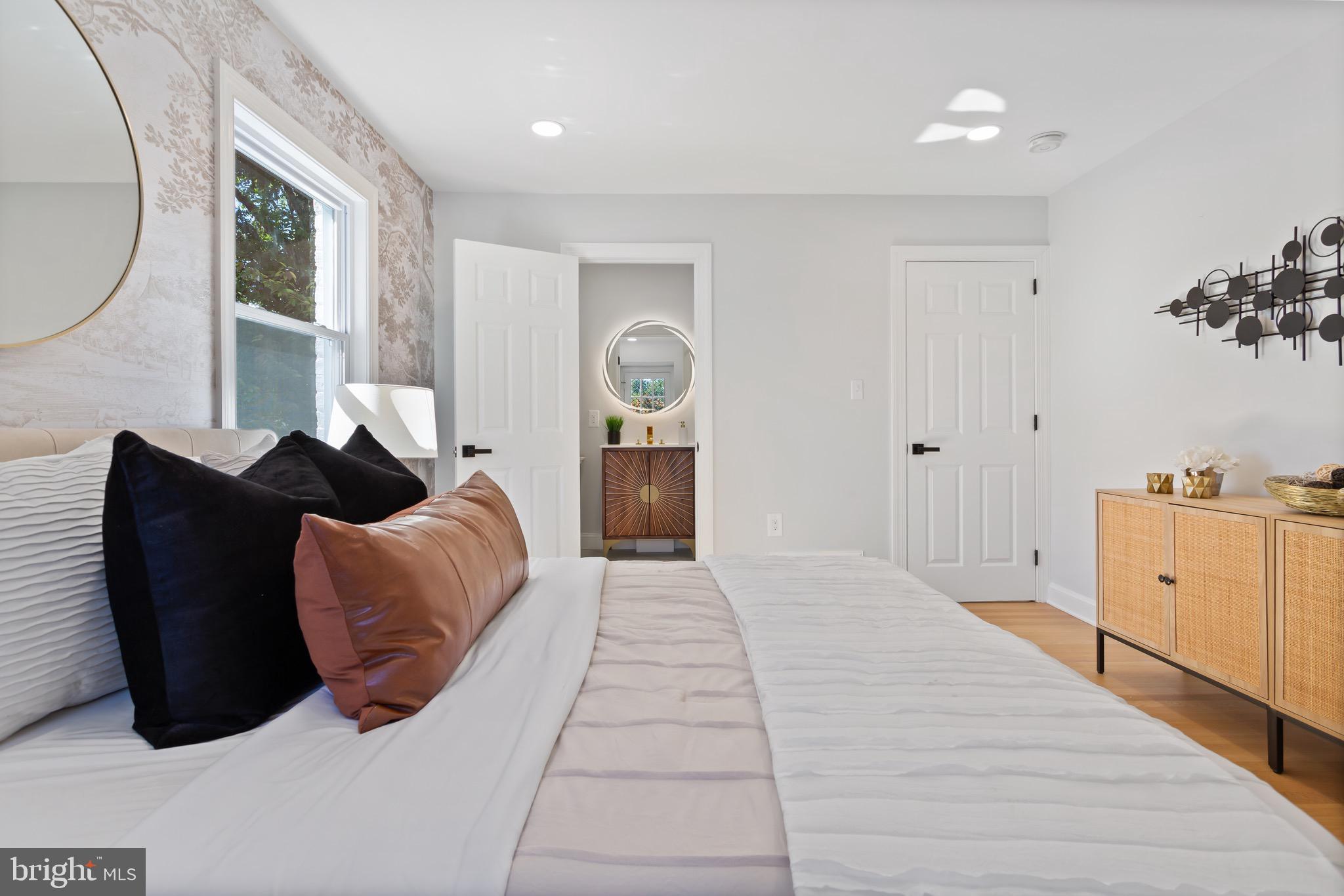 617 Greenbrier Drive Silver Spring, MD 20910 - Photo 39 of 70 a bed room with a bed and a large window