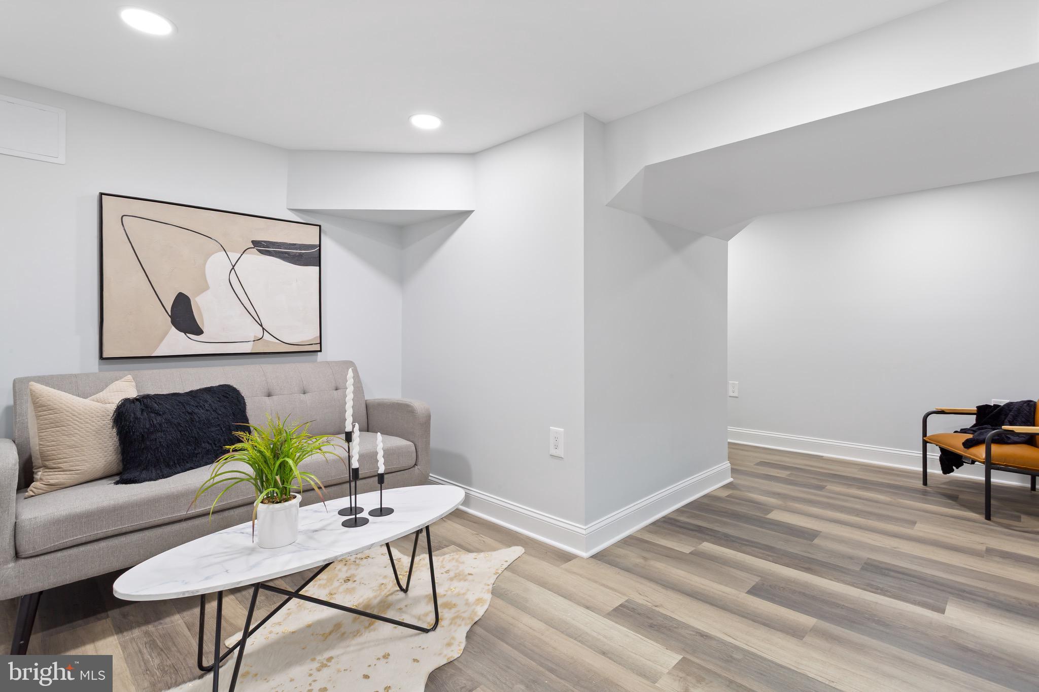 617 Greenbrier Drive Silver Spring, MD 20910 - Photo 57 of 70 a living room with furniture and a wooden floor