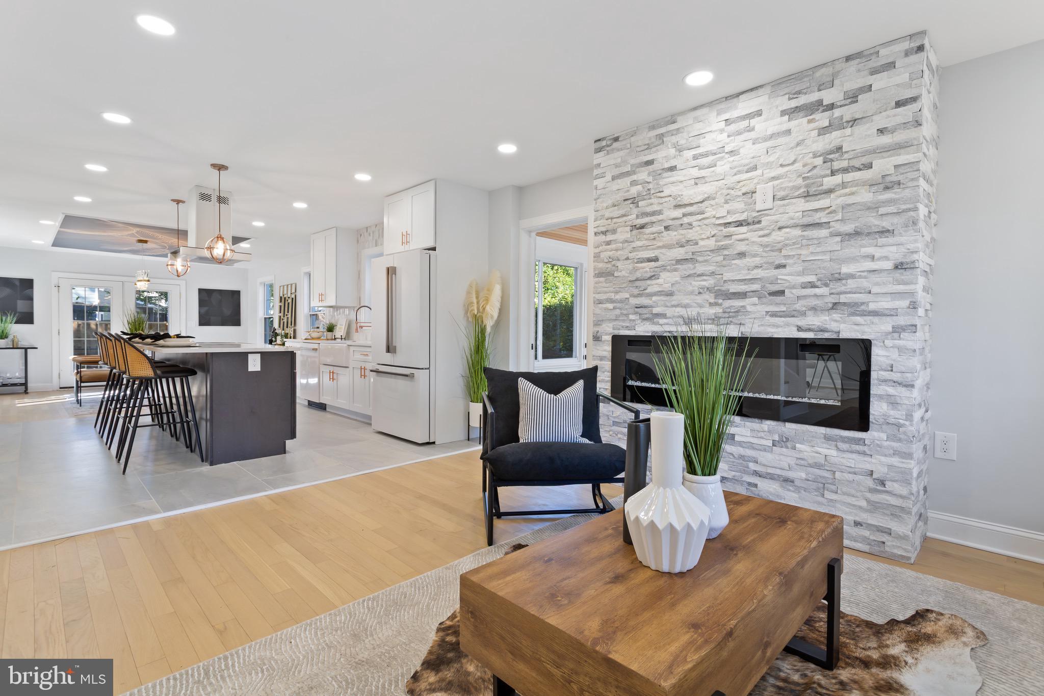 617 Greenbrier Drive Silver Spring, MD 20910 - Photo 8 of 70 a living room with furniture and a fireplace