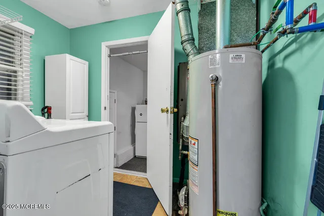 a room with cabinets and utility room